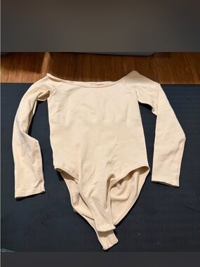 women’s Long Sleeve One-Piece Bodysuit in Cream — Classic Fit